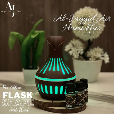 Air humidifier flask shape with 3 scents, placed on a wooden floor.