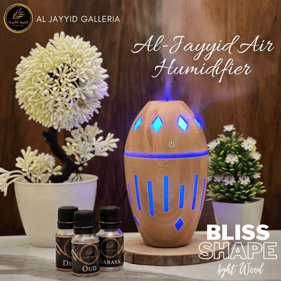 Air Humidifier Bliss Shape by Al Jayyid Galleria in light wood colour. with 3 free scents