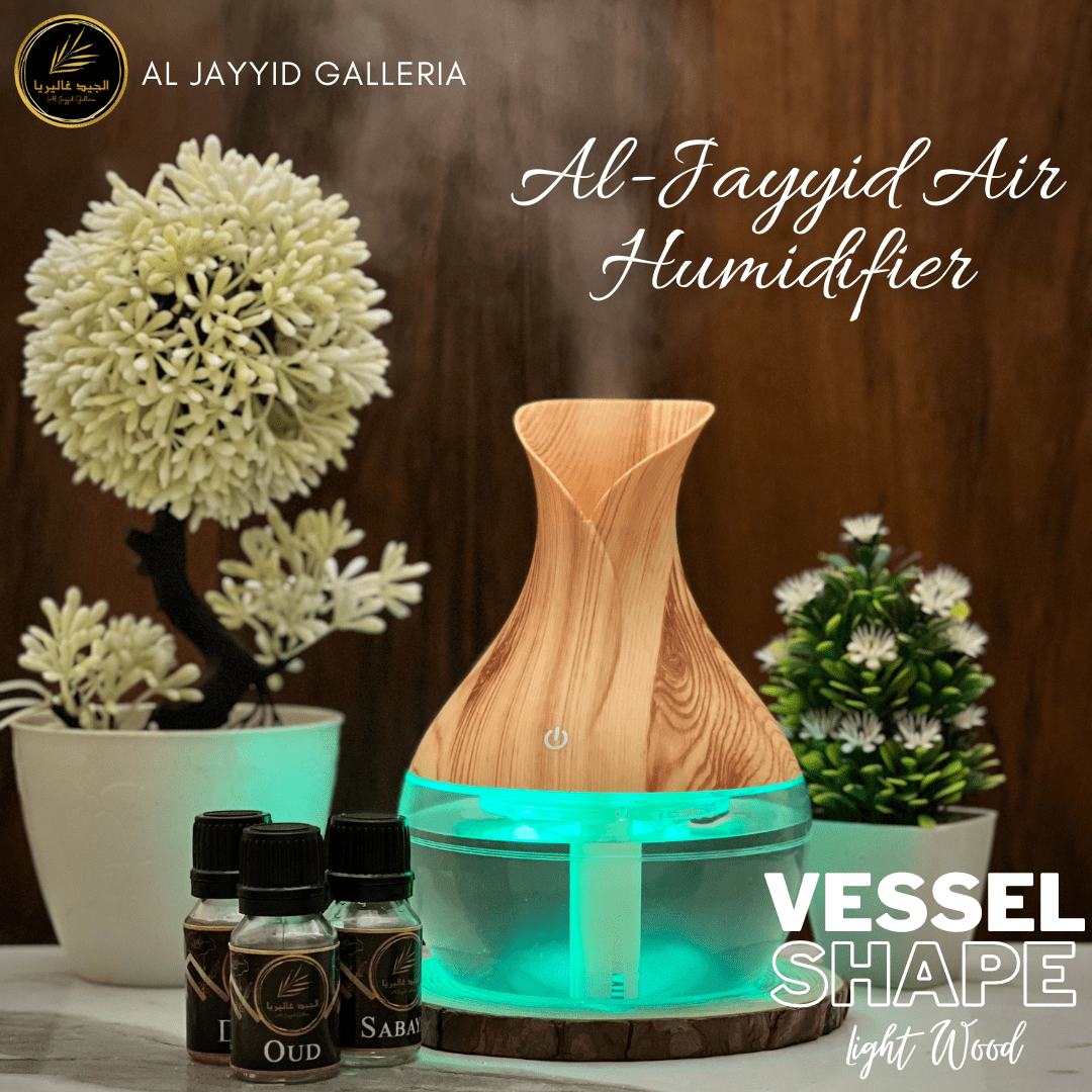 Air Humidifier Vessel Shape by Al Jayyid Galleria in dark wood colour. with 3 free scents.