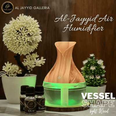 Air Humidifier Vessel Shape in light wood colour with green light & 3 free natural scents.