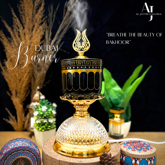 Dubai 'دبئی' Electric Bakhoor Burner in white, Black & golden edition placed with bakhoors on a wooden board showing scented smoke. 