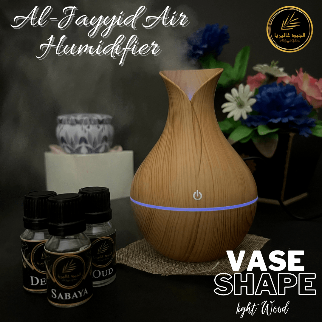 Air humidifier Vase shape in light wood colour with 3 free scents